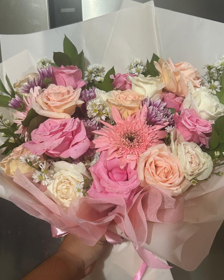 medium sized flower bouquet with pink white and nude roses by grazie bali