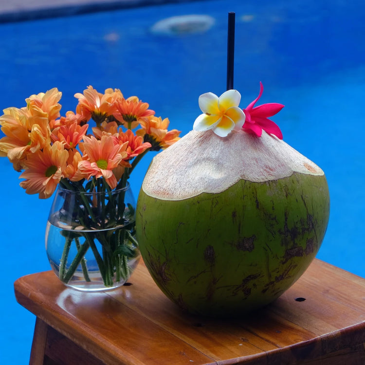 flowers bouquet as additional arrangement for floating breakfast in bali for special moments