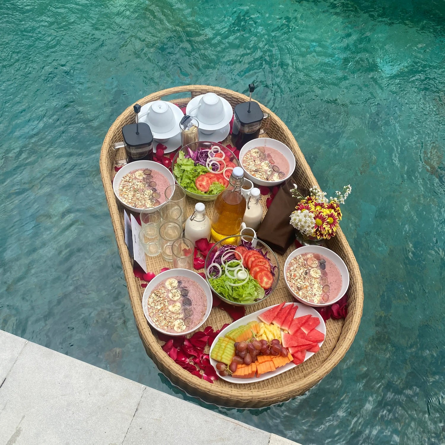 vegan floating breakfast by grazie bali with dragonfruit and banana pancake