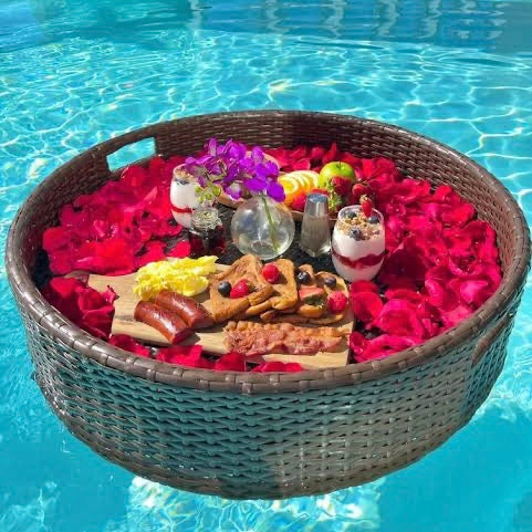 lavis flower set up for floating breakfast tray inside a pool in bali