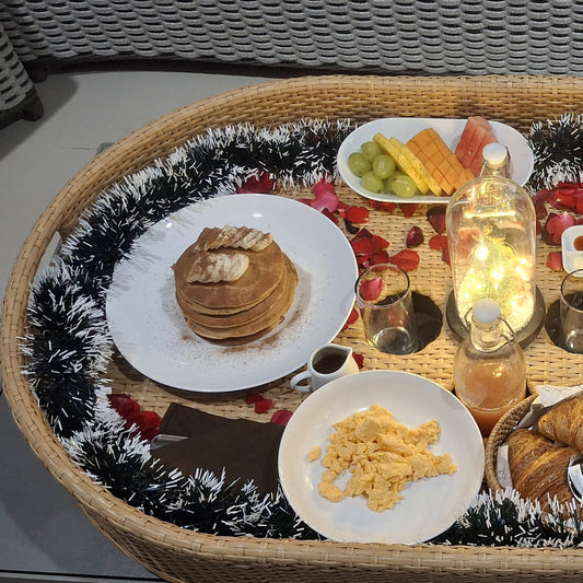 banana pancake on a floating breakfast basket by grazie bali